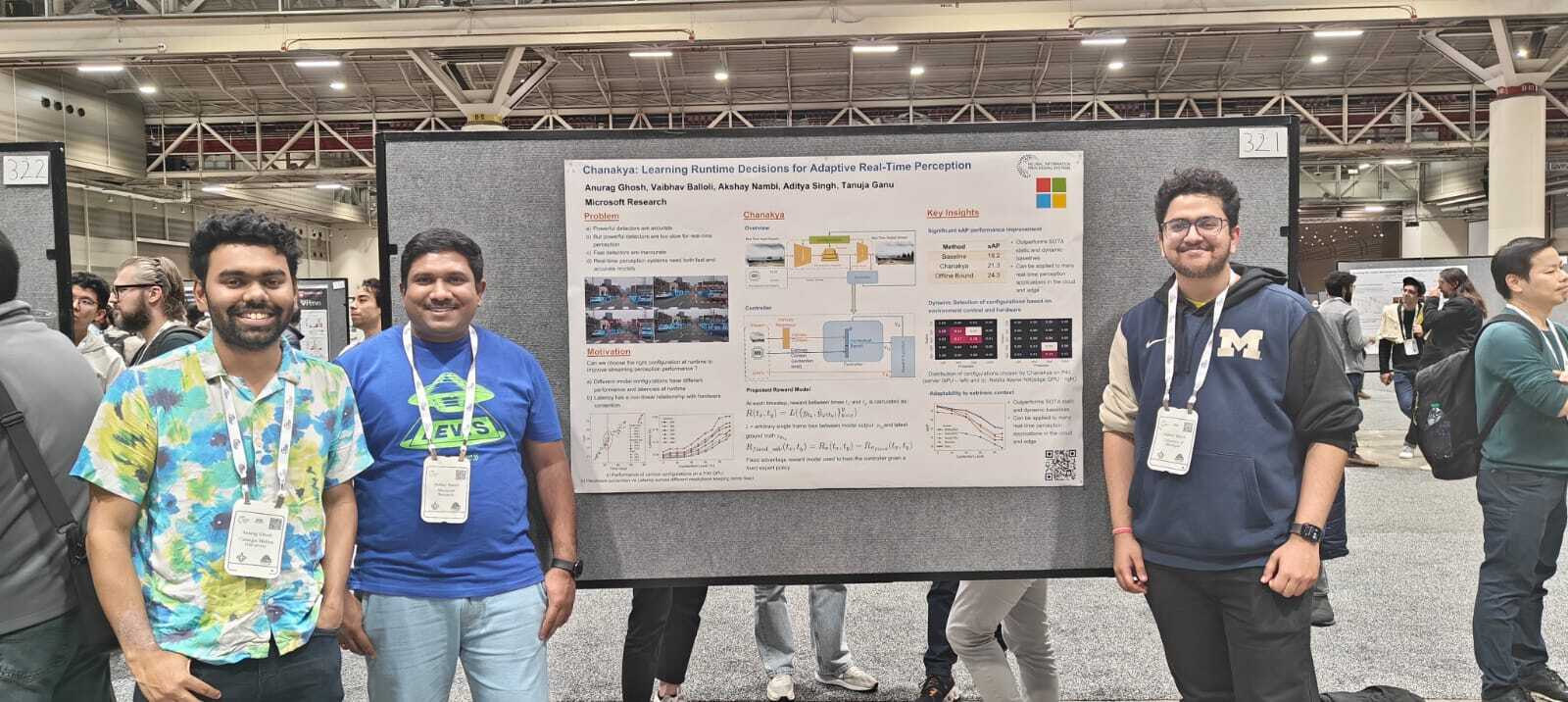 Photo of Anurag, Akshay and Me from left to right with our poster